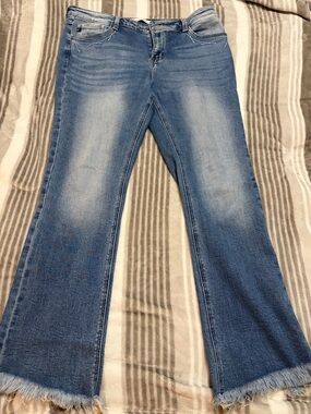 Kancan Women’s Blue Flared Jeans with Raw Hem